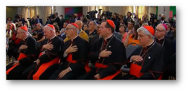 Cardinals and Bishops lay hands over hearts for pagan ceremony